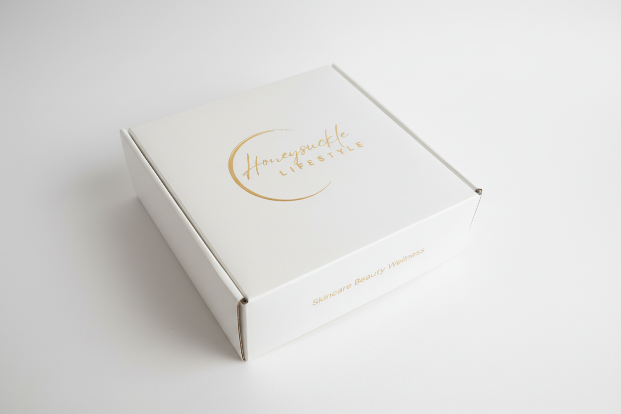 Cream card stock box with gold foil lettering on cover and inside.