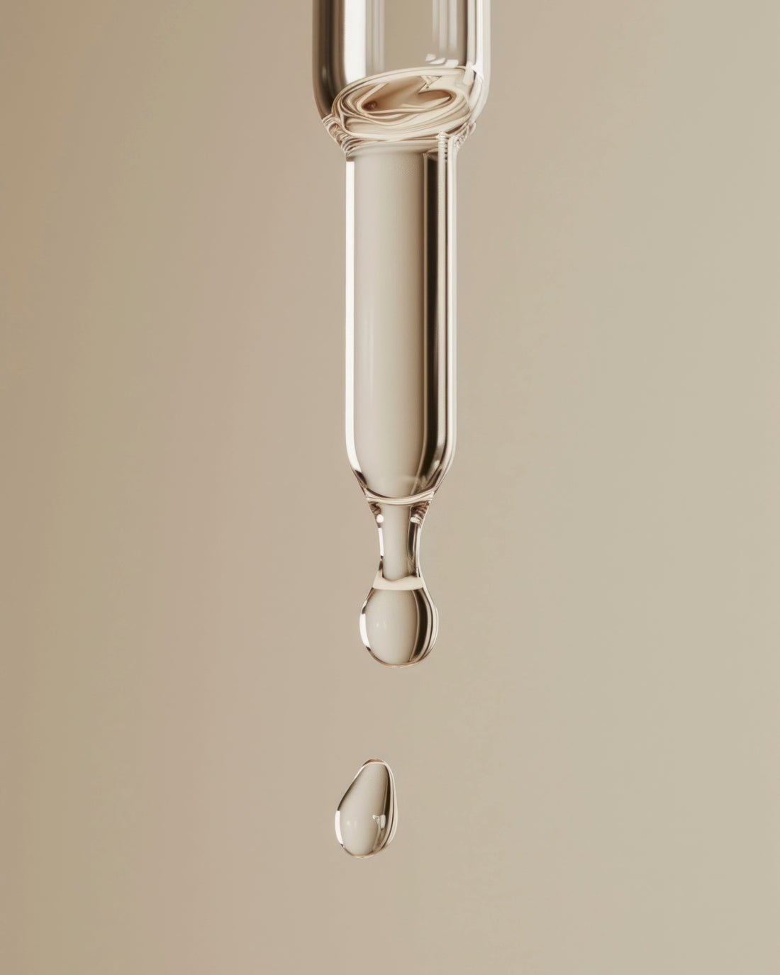 Rich facial serum flowing from a dropper