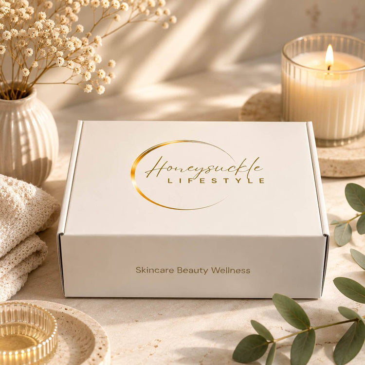 signature box with 'Honeysuckle Lifestyle' branding on a table with decorative items.