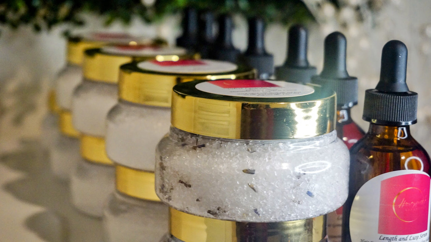Row of skincare products with jars and bottles on a blurred background