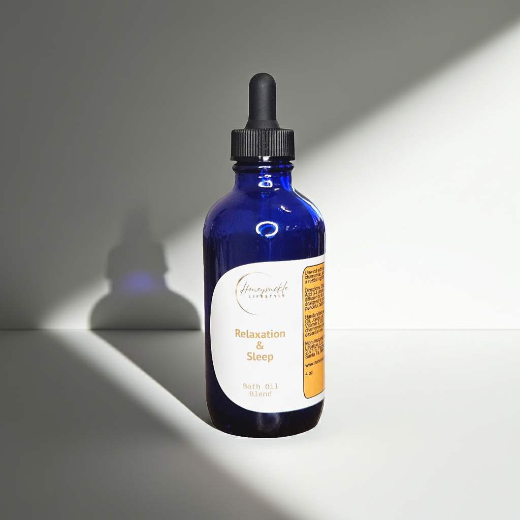 Blue bottle with dropper labeled 'Sleep' on a gray background