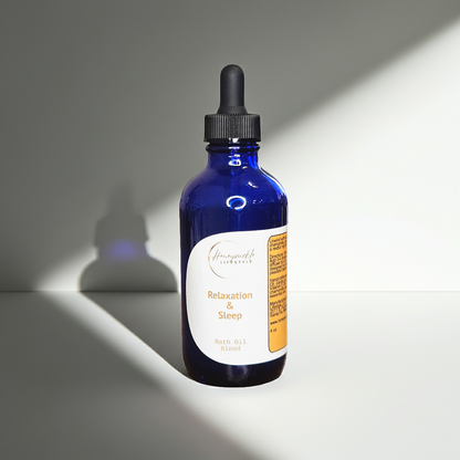 Blue bottle with dropper labeled 'Sleep' on a gray background