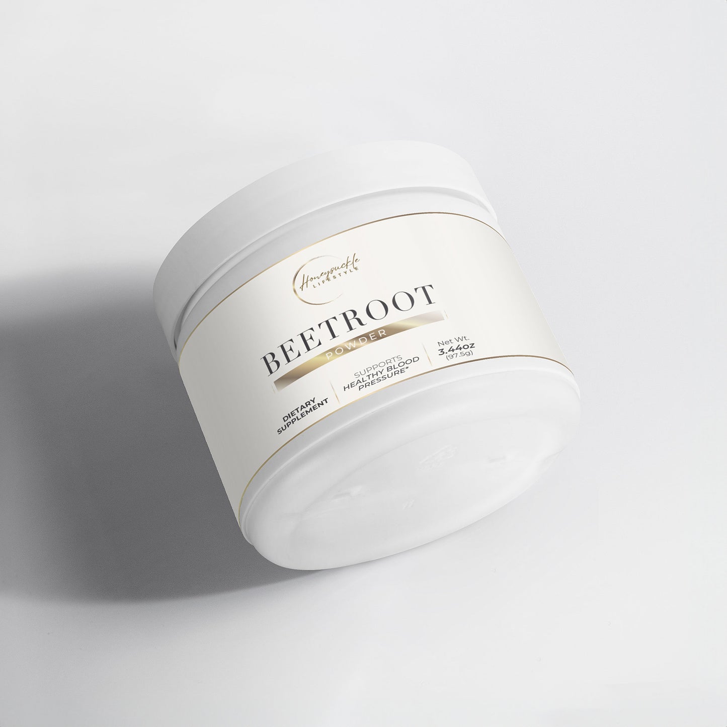 Jar of beetroot powder on a light gray background