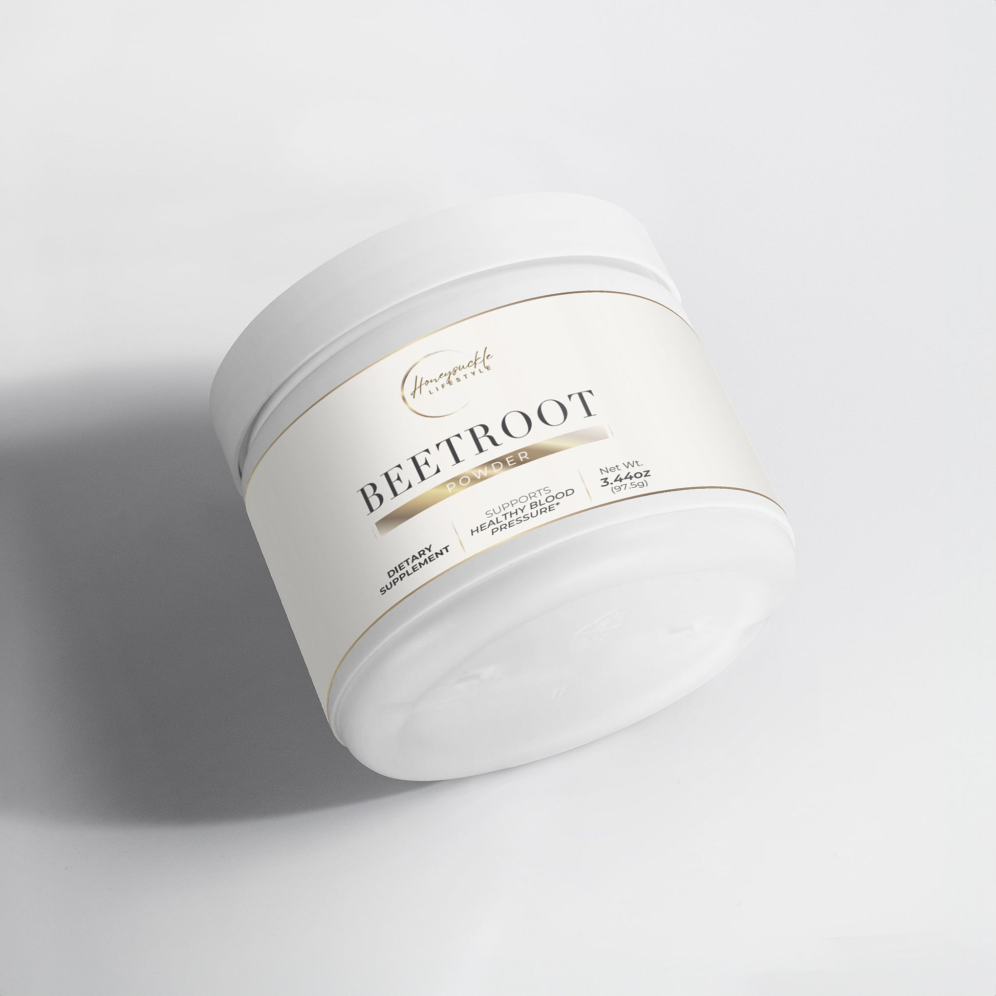 Jar of beetroot powder on a light gray background