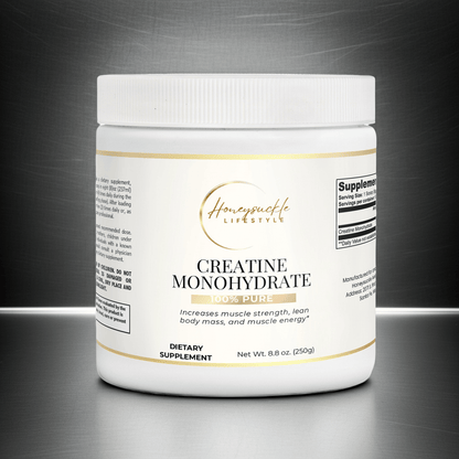 Supplement container labeled 'Creatine Monohydrate' on a reflective surface with a dark background