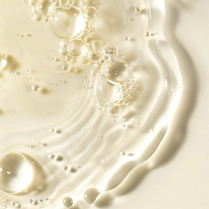 Close-up of creamy green tea antioxidant serum texture 