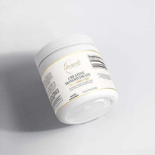 Supplement container labeled 'Creatine Monohydrate' on a light gray background
