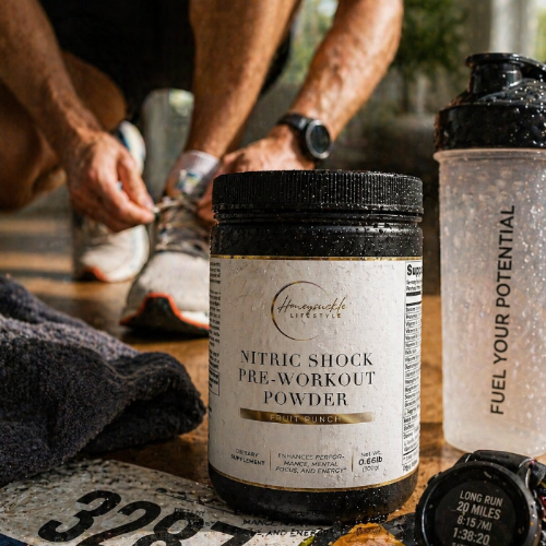 Pre-workout powder container with a shaker bottle and marathon-themed items on a table.