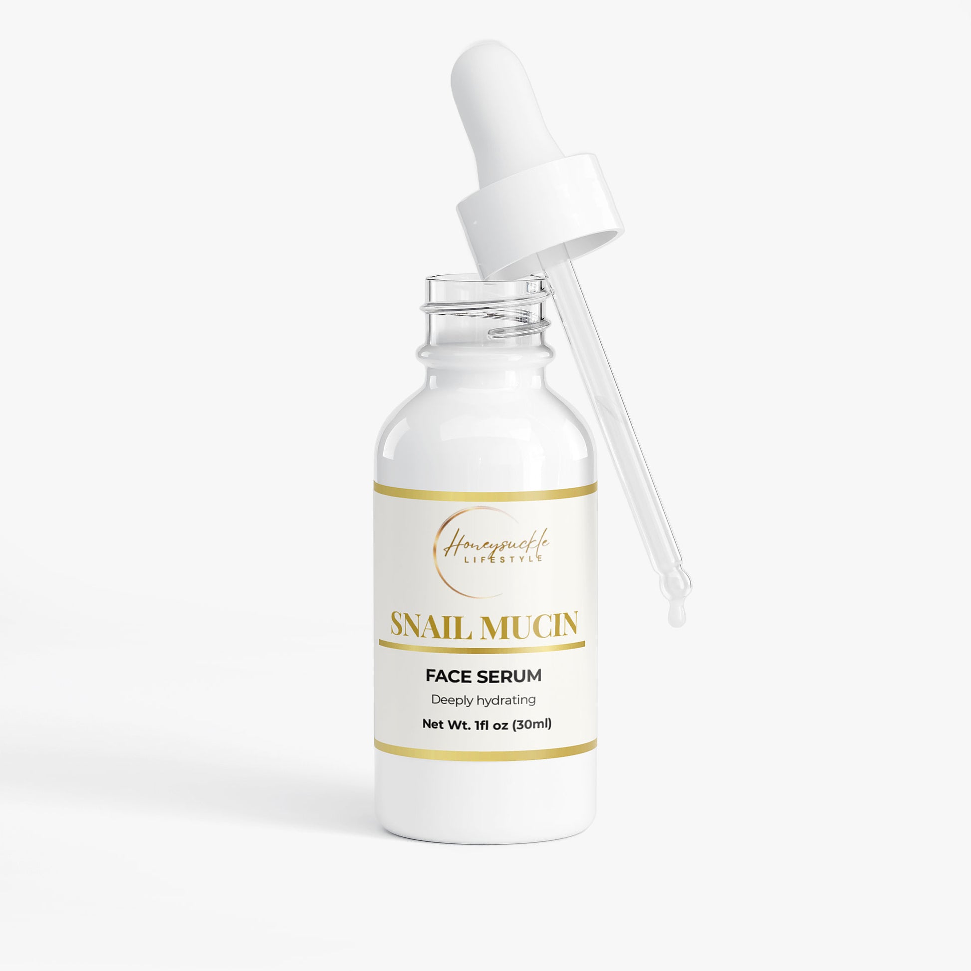 Snail mucin face serum bottle with dropper on a white background